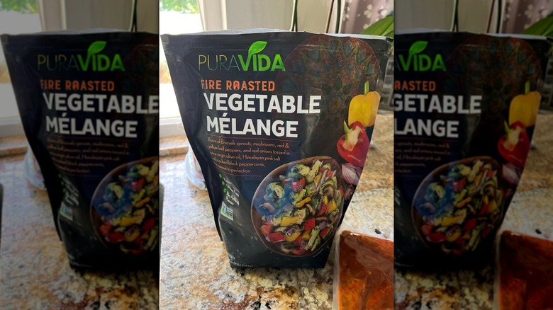 A bag of PuraVida Fire Roasted Vegetable Mélange on a kitchen counter