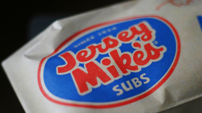 Jersey Mike's sub in paper with Jersey Mike's logo
