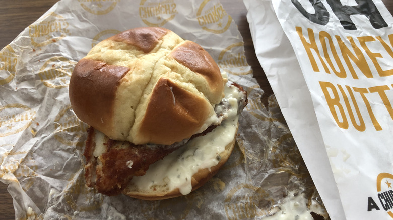 Church's chicken fried fish sandwich on paper