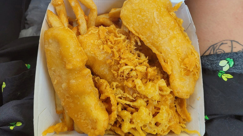 Chicken planks with some crispy batter bits and fries from Long John Silver's