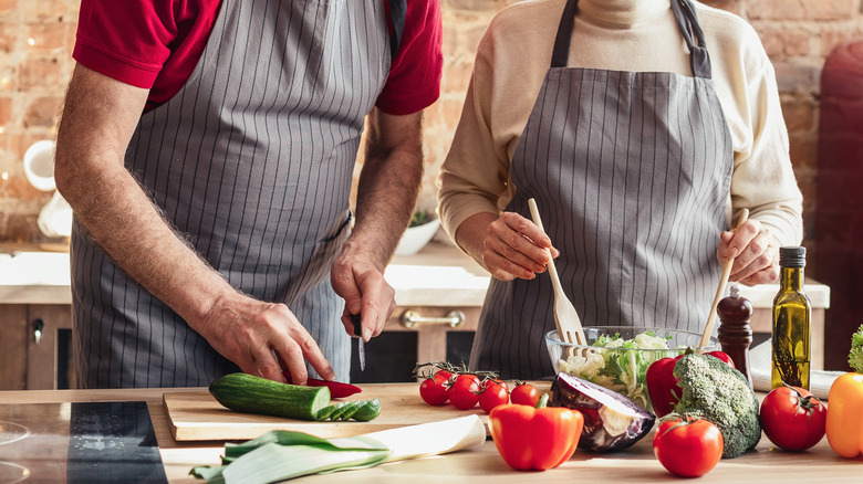older couple cooking together
