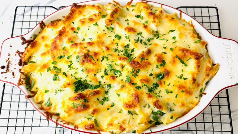 Chicken Alfredo bake topped with parsley