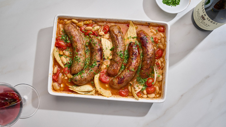 pan filled with sausage and tomatoes