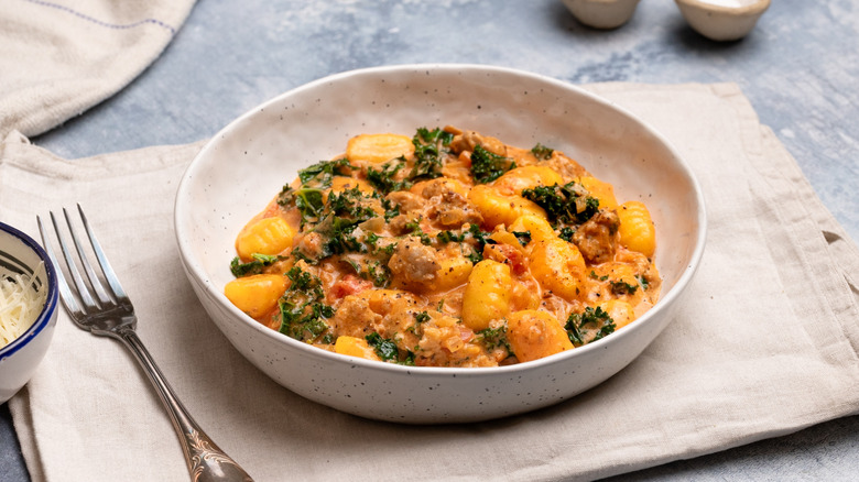 Sausage and gnocchi in bowl
