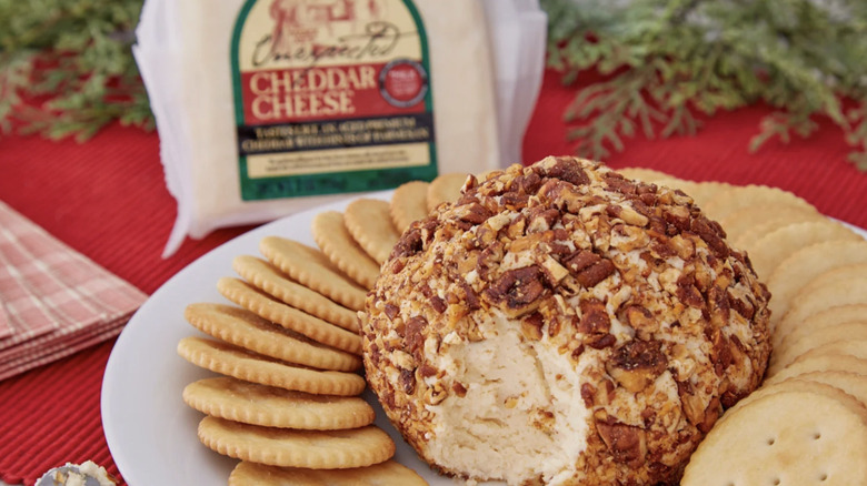 unexpected cheddar cheese at Trader Joe's with cheese ball and crackers on white plate