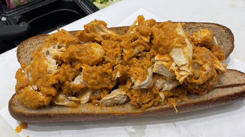 A chicken tender pub sub with sauce