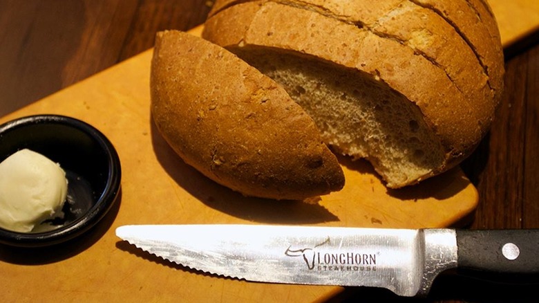 LongHorn Steakhouse bread with butter on board