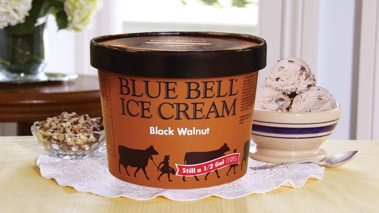 half gallon of Black Walnut ice cream with bowl and nuts