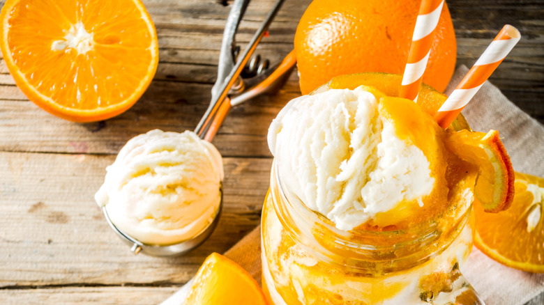 orange creamsicle drink with ice cream and fresh oranges