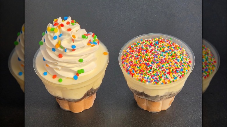 Dairy Queen Cupcake next to a Dot Cupcake on a table