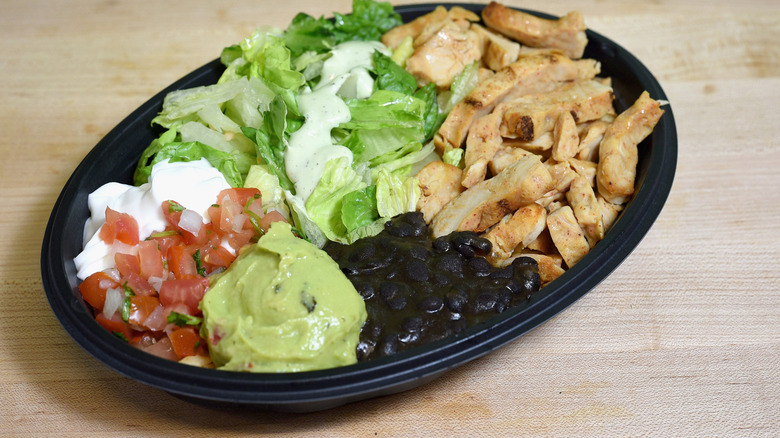Taco Bell Power Bowl on wooden table surface