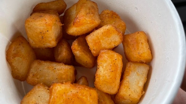 plain Taco Bell potatoes inside white containers