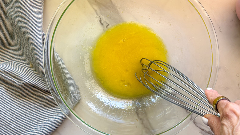 eggs whisked in glass bowl