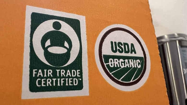 Close-up of Fair Trade Certified and USDA Organic labels on a product box, Lafayette, California, June, 2024. (Photo by Smith Collection/Gado/Getty Images)