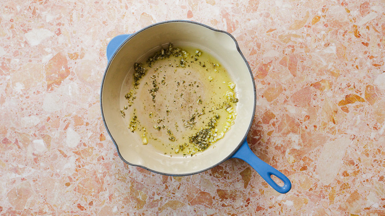 Dutch oven with garlic and oregano