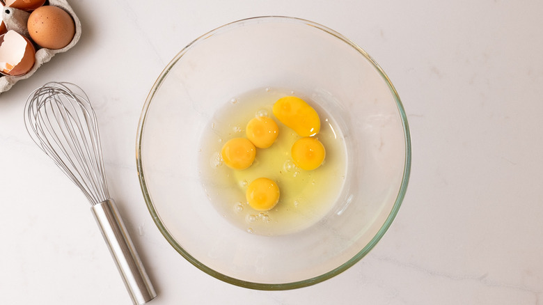 cracked eggs in a bowl
