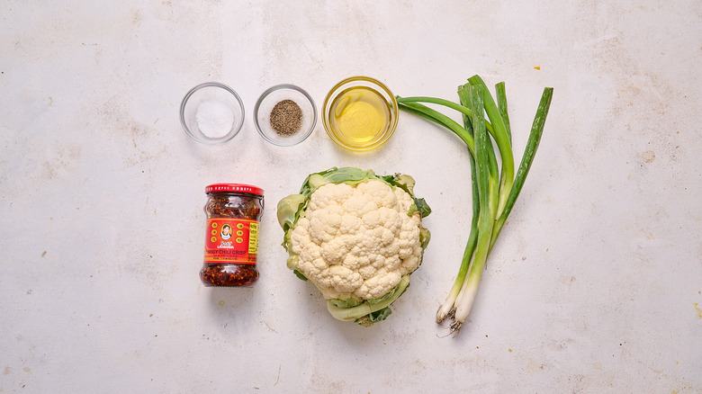 Chili crisp cauliflower steak ingredients on table