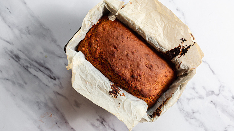 Baked loaf of beer bread in pan