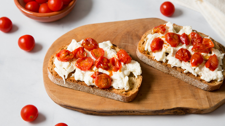 burrata toast on wooden board