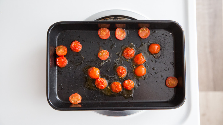 roasted tomatoes in black pan