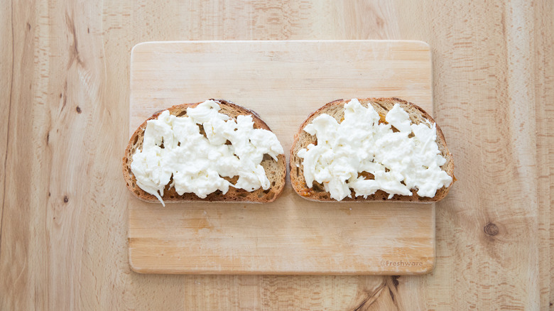 burrata-topped toast on board