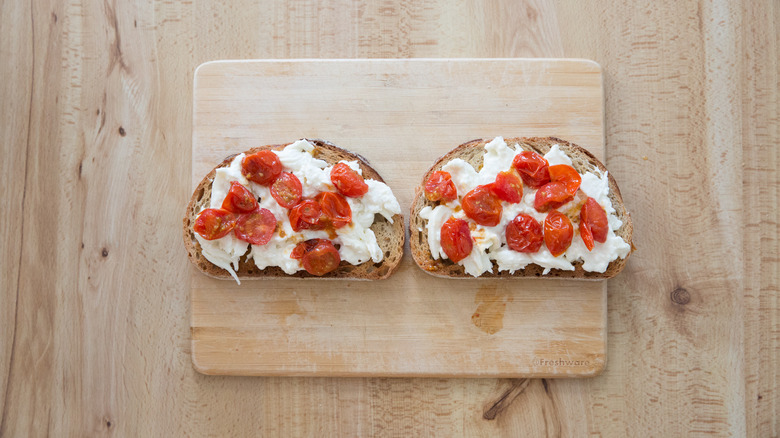 burrata toast on wooden board