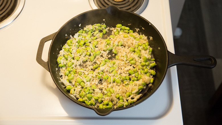 vegetable sautee cooking in pan