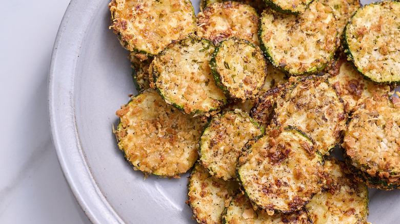Zucchini chips on plate