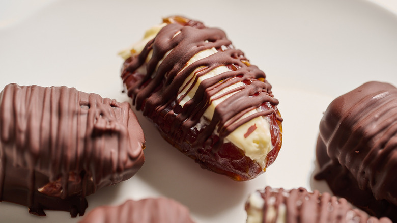 Chocolate cheesecake date bites on plate