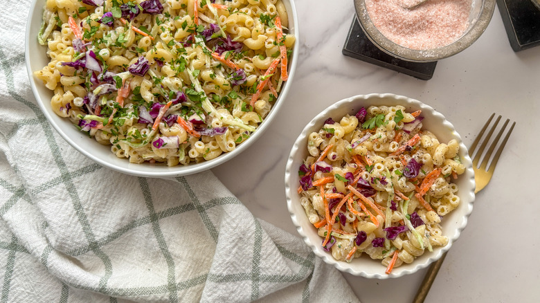 Macaroni salad in serving bowl and smaller bowl