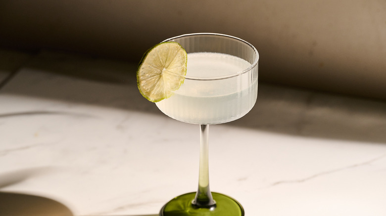 Vodka gimlet garnished with lime wheel