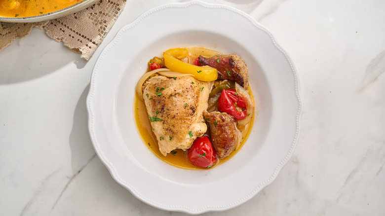 chicken scarpariello plated in a bowl
