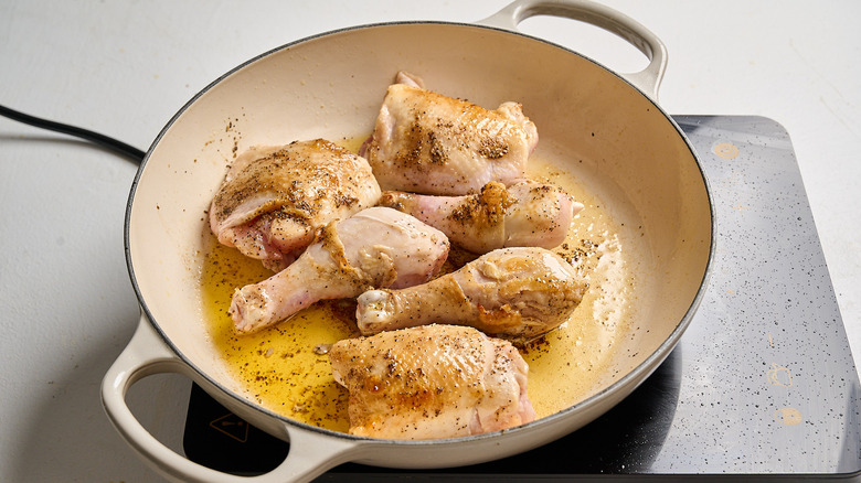 browning chicken in a skillet