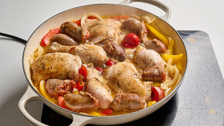 chicken simmering in broth