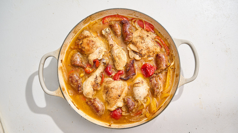 baked chicken scarpariello in a skillet