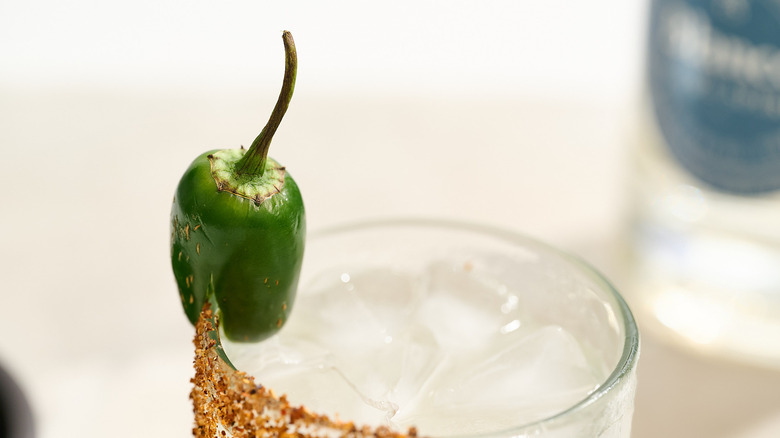 jalapeno garnish on the rim of a margarita