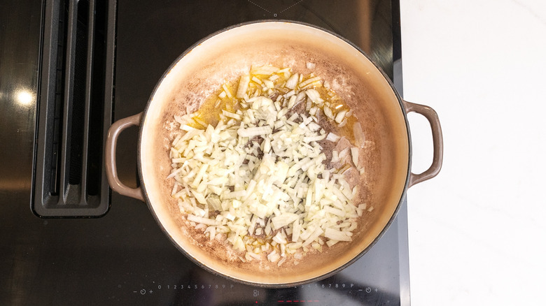sautéing diced onions on hob