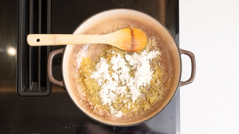 flour in pan with onions