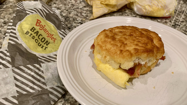 Bacon, Egg & Cheese Biscuit on a white plate