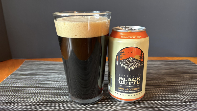 Can of Deschutes Black Butte NA next to a full glass