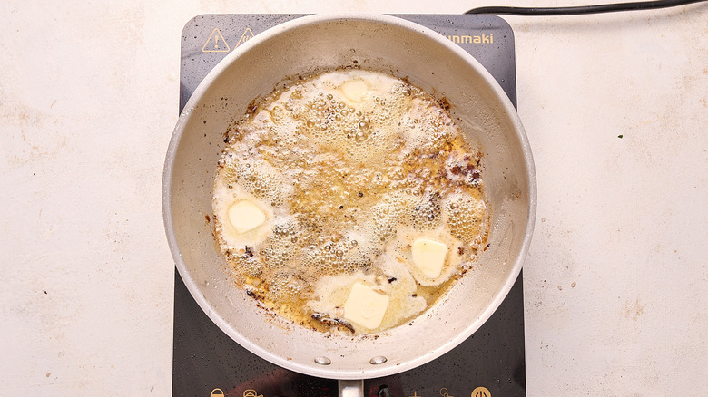 melting butter in a skillet