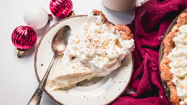 Slice of old-fashioned eggnog pie with spoon