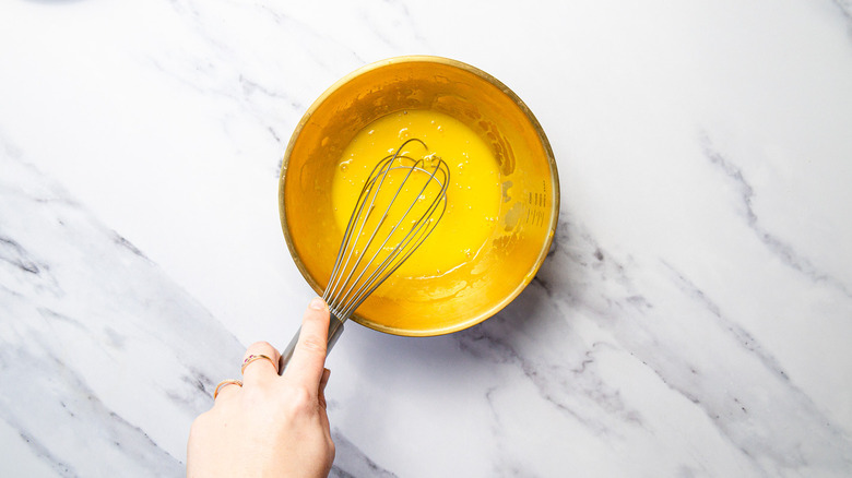 Whisking egg yolks