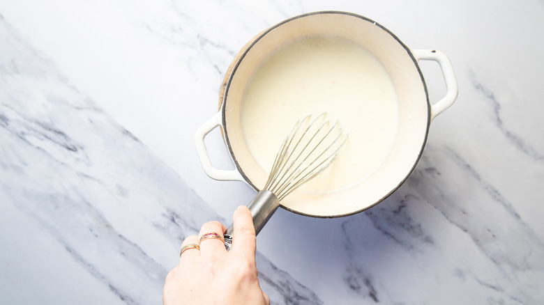 Whisking custard in pot