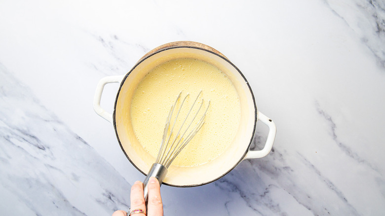 Whisking custard in pot