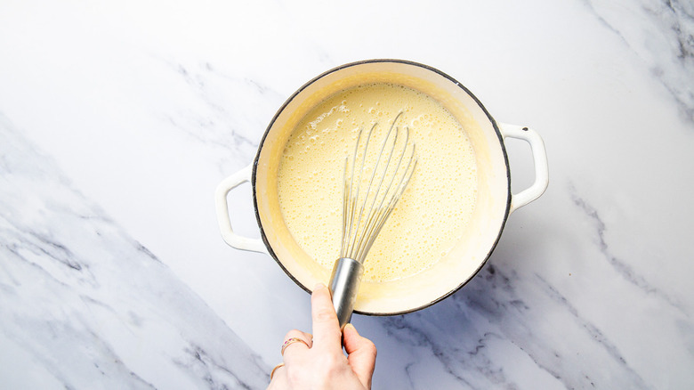 Whisking custard in pot