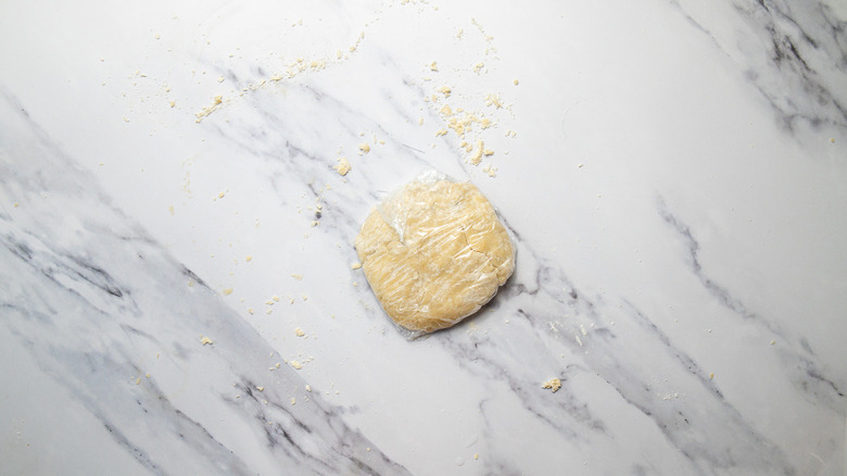 Pie dough wrapped in plastic