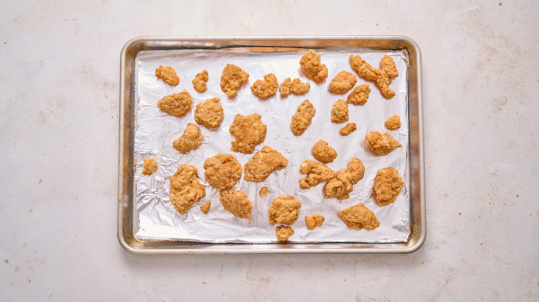 chicken bites on a sheet tray