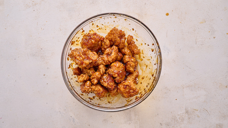 chicken coated with orange chicken sauce