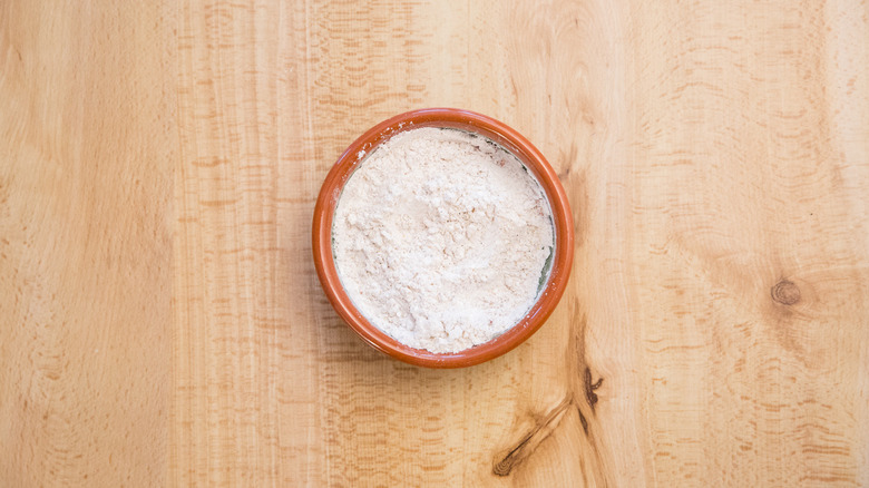 flour in small terracotta dish